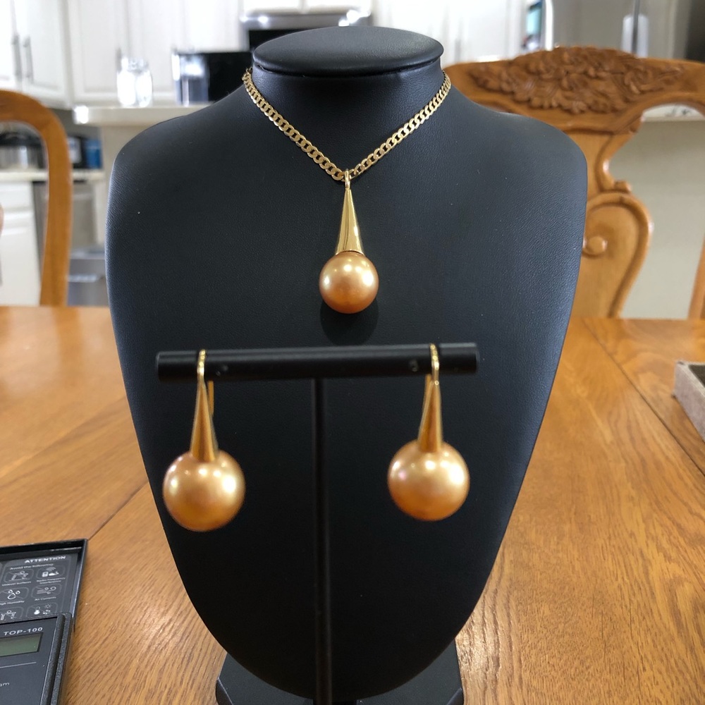 Authentic over 15mm South Sea Pearl Gold in 14k solid gold settings.